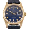 Reloj unisex rolex day date oro y piel y esfera azul, una pieza clásica de lujo para quienes buscan elegancia y distinción.