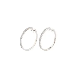 Pendientes de aro oro blanco y diamantes en diseño elegante.