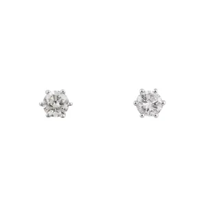 Pendientes dormilonas oro blanco brillantes talla redonda.