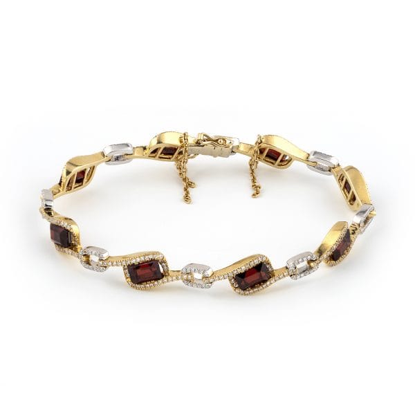 PULSERA ARTICULADA DE ORO BLANCO Y AMARILLO CON GRANATES Y BRILLANTES